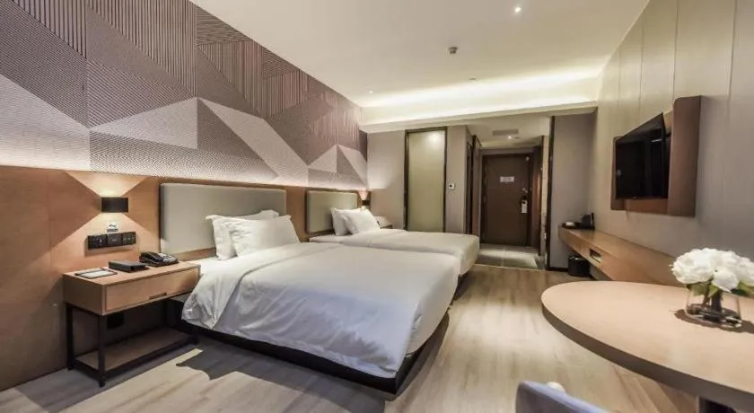 Bed in Borrman Hotel Liuzhou Guizhong Avenue Liugao