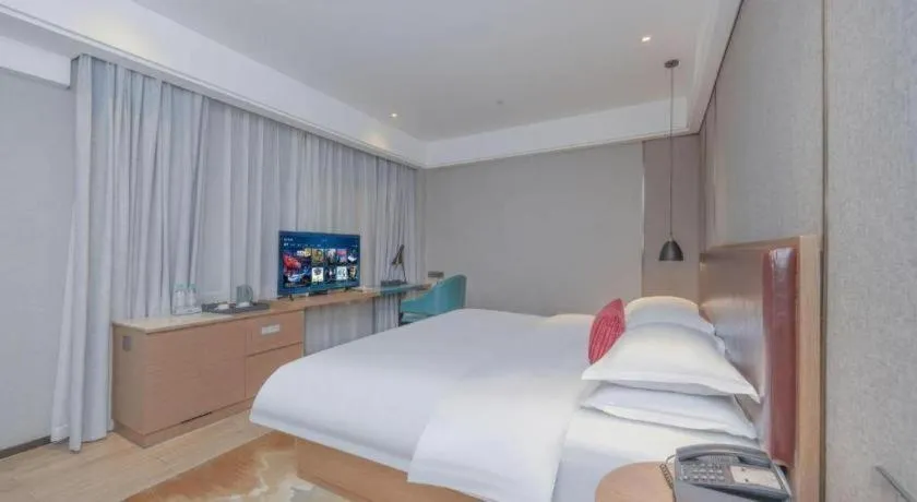 Bed in Borrman Hotel Liuzhou Guizhong Avenue Liugao