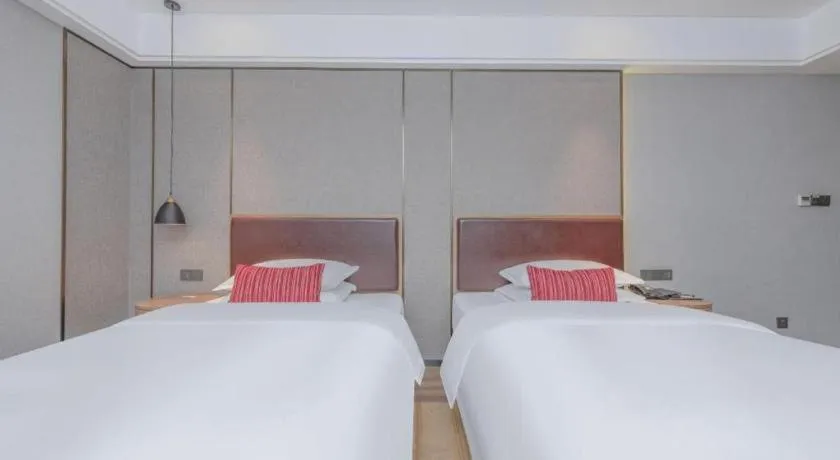 Bed in Borrman Hotel Liuzhou Guizhong Avenue Liugao