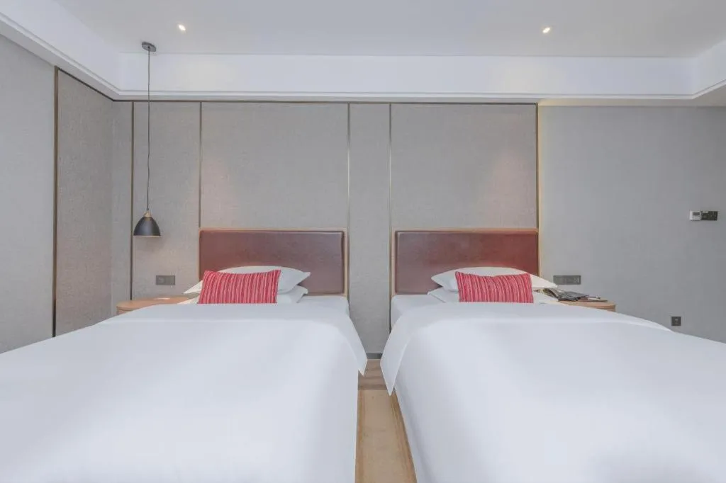 Bed in Borrman Hotel Liuzhou Guizhong Avenue Liugao