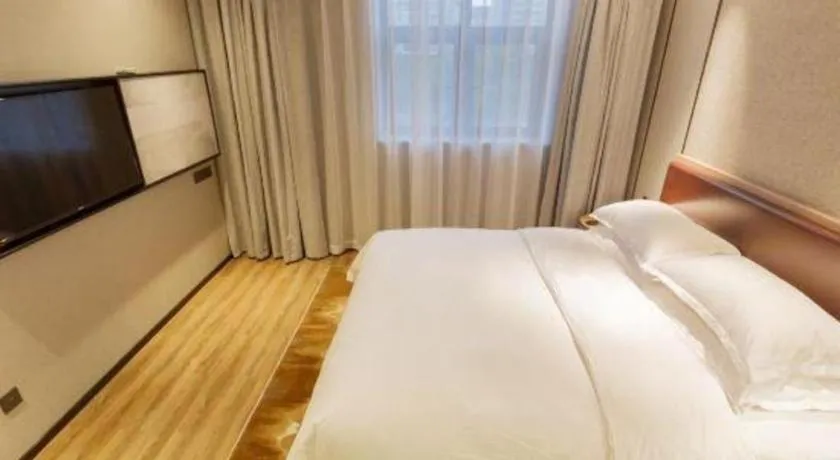 Bed in Borrman Hotel Liuzhou Guizhong Avenue Liugao