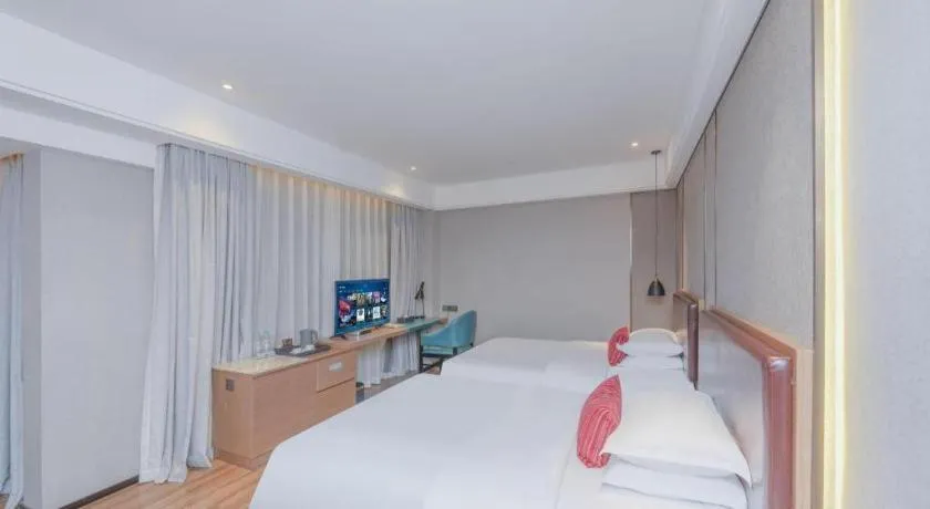 Bed in Borrman Hotel Liuzhou Guizhong Avenue Liugao