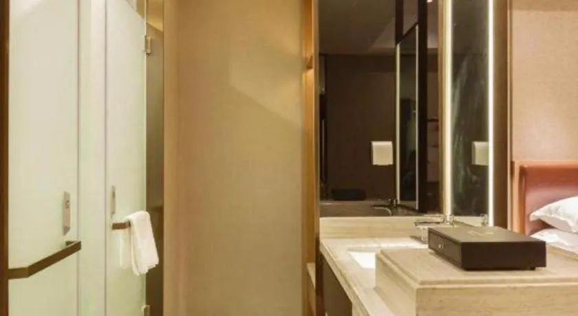 Bed in Borrman Hotel Liuzhou Guizhong Avenue Liugao