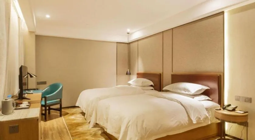 Bed in Borrman Hotel Liuzhou Guizhong Avenue Liugao