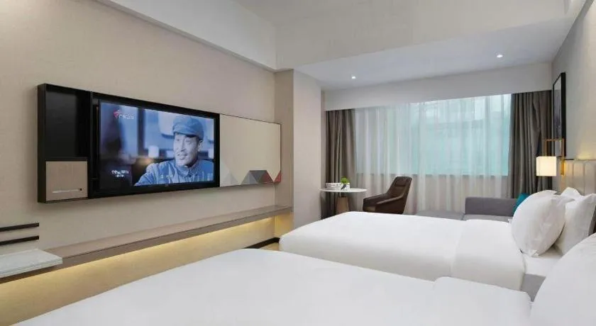Bed in Borrman Hotel Liuzhou Guizhong Avenue Liugao
