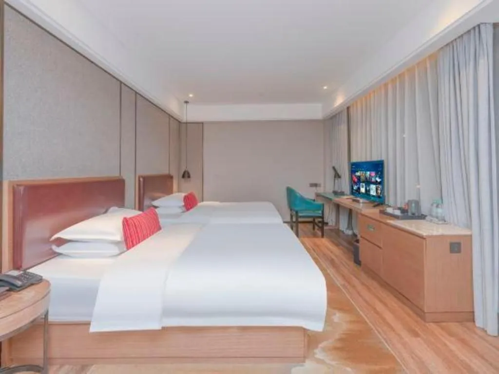 Bed in Borrman Hotel Liuzhou Guizhong Avenue Liugao
