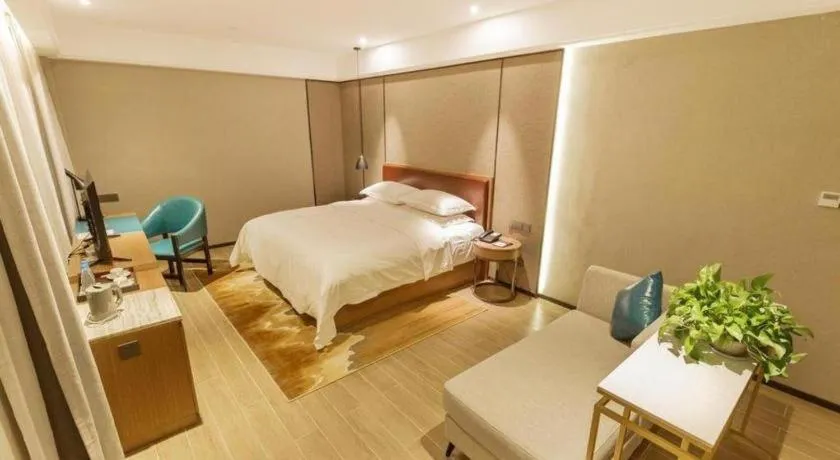 Bed in Borrman Hotel Liuzhou Guizhong Avenue Liugao
