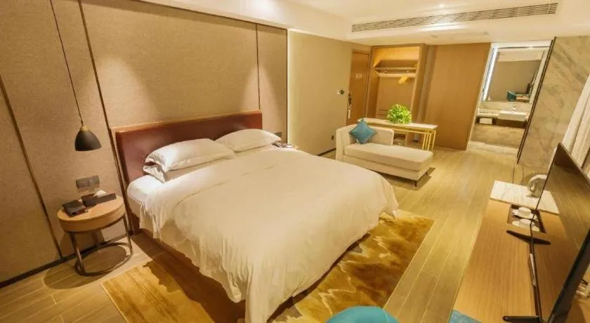 Bed in Borrman Hotel Liuzhou Guizhong Avenue Liugao