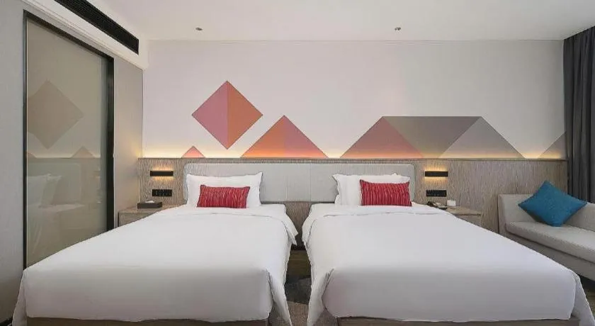 Bed in Borrman Hotel Liuzhou Guizhong Avenue Liugao