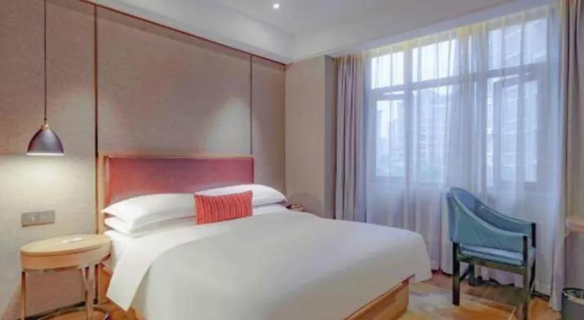 Bed in Borrman Hotel Liuzhou Guizhong Avenue Liugao
