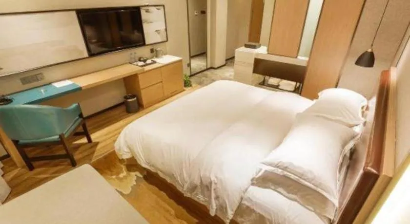 Bed in Borrman Hotel Liuzhou Guizhong Avenue Liugao