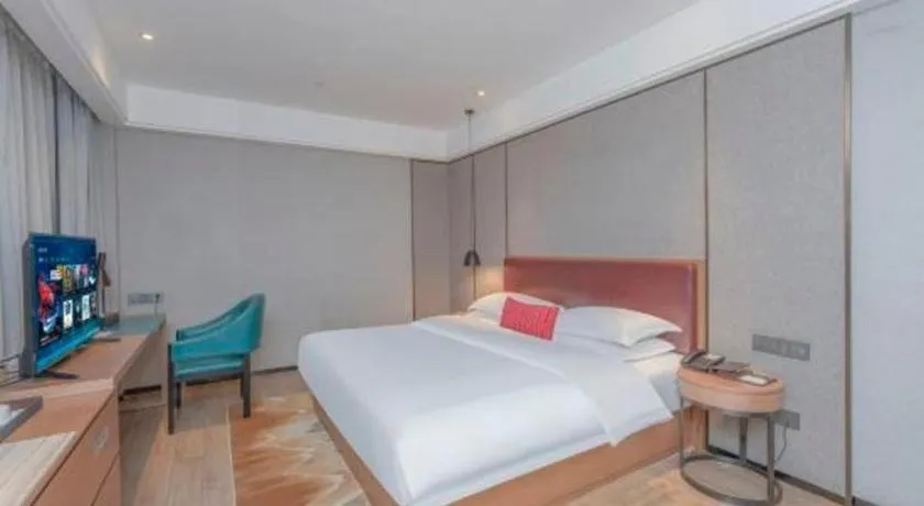 Bed in Borrman Hotel Liuzhou Guizhong Avenue Liugao