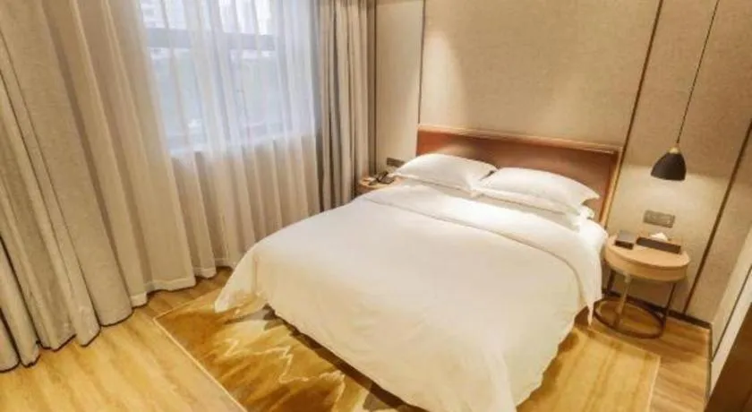 Bed in Borrman Hotel Liuzhou Guizhong Avenue Liugao