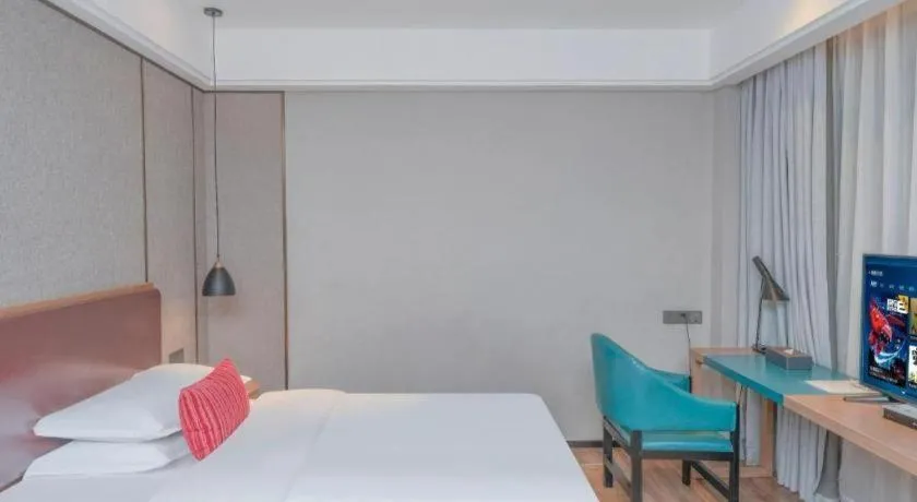 Bed in Borrman Hotel Liuzhou Guizhong Avenue Liugao