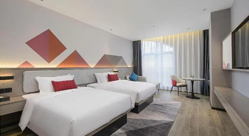 Bed in Borrman Hotel Liuzhou Guizhong Avenue Liugao