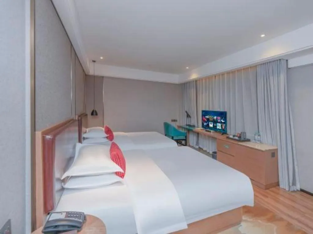 Bed in Borrman Hotel Liuzhou Guizhong Avenue Liugao