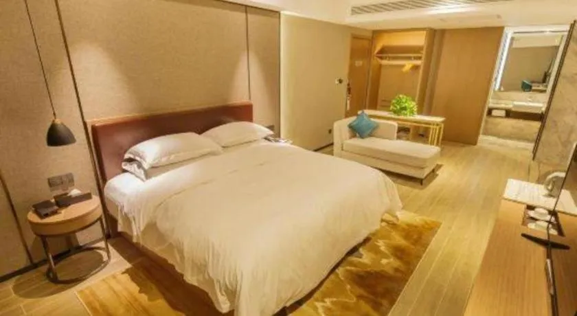 Bed in Borrman Hotel Liuzhou Guizhong Avenue Liugao