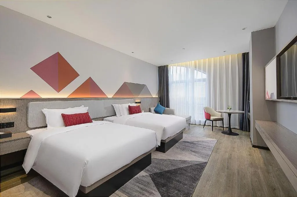 Bed in Borrman Hotel Liuzhou Guizhong Avenue Liugao