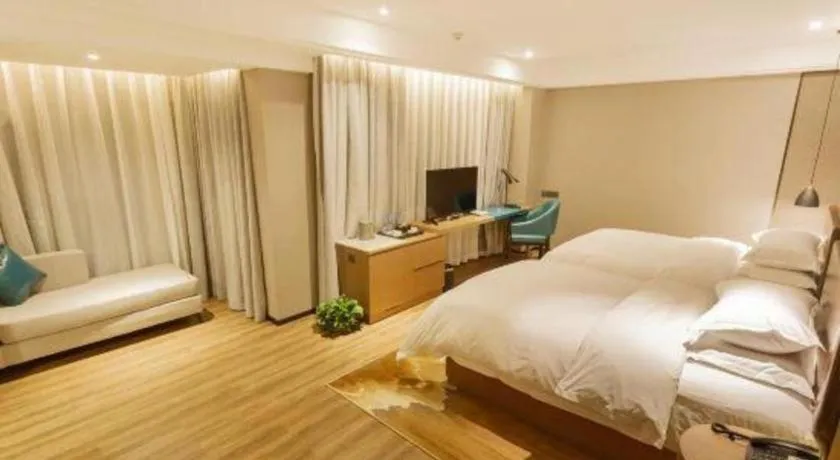 Bed in Borrman Hotel Liuzhou Guizhong Avenue Liugao