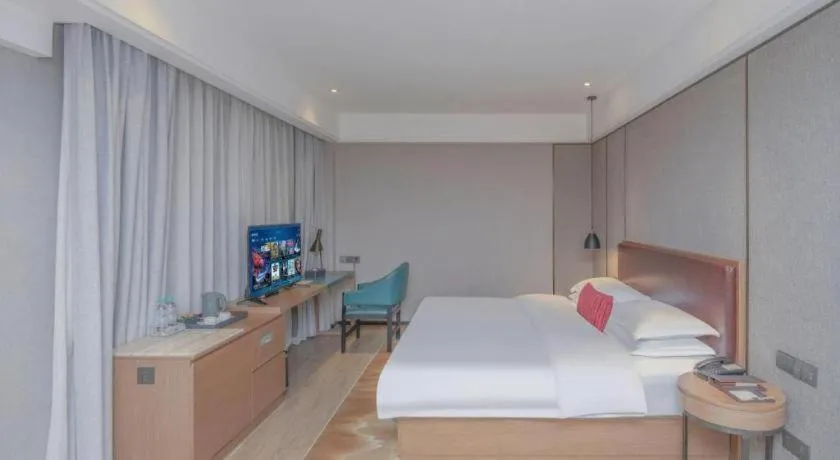 Bed in Borrman Hotel Liuzhou Guizhong Avenue Liugao