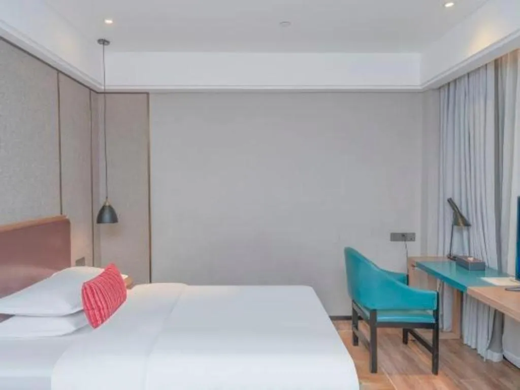 Bed in Borrman Hotel Liuzhou Guizhong Avenue Liugao