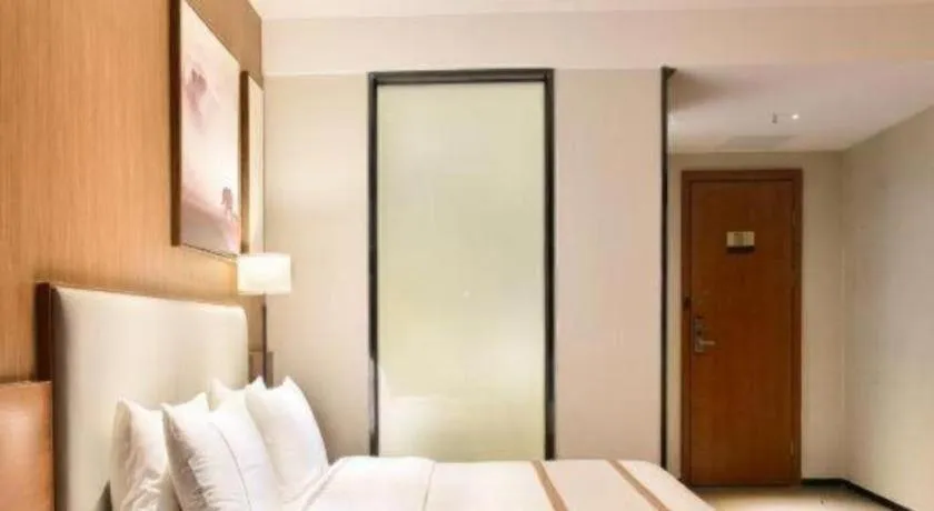 Bed in Jtour Inn Xianning Chongyang Taoxi Avenue