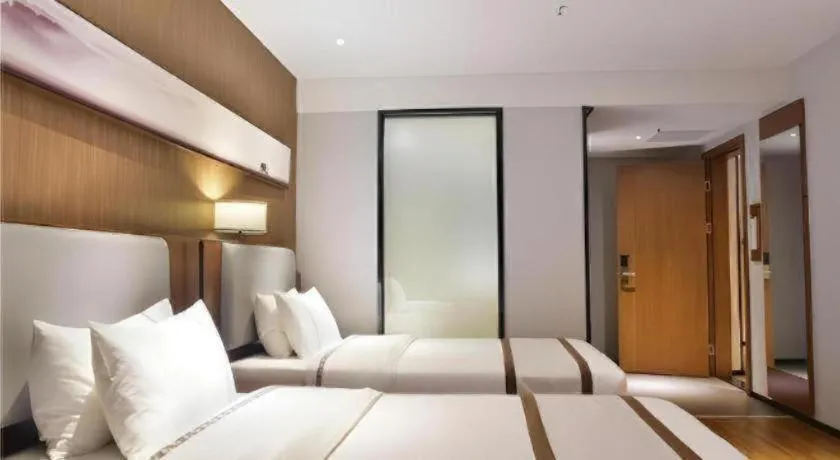 Bed in Jtour Inn Xianning Chongyang Taoxi Avenue