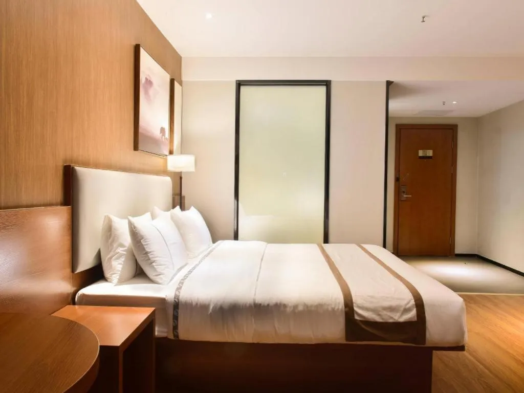 Bed in Jtour Inn Xianning Chongyang Taoxi Avenue