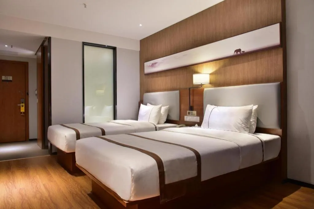 Bed in Jtour Inn Xianning Chongyang Taoxi Avenue
