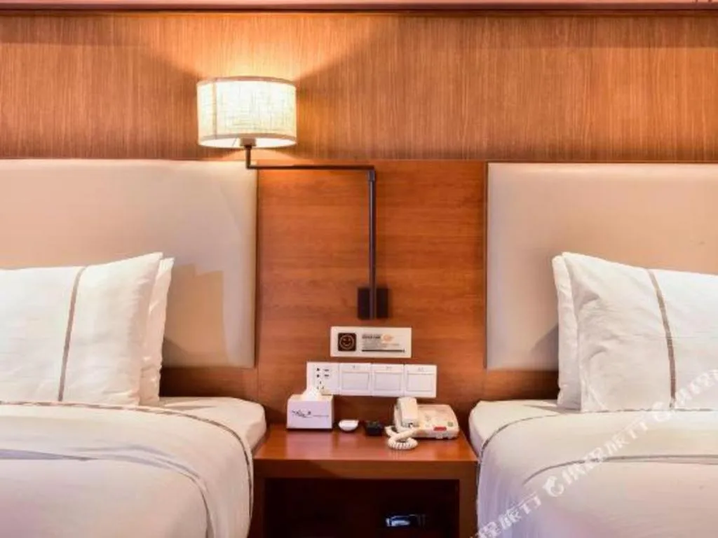 Bed in Jtour Inn Xianning Chongyang Taoxi Avenue