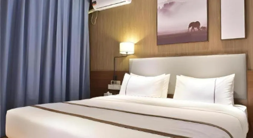 Bed in Jtour Inn Xianning Chongyang Taoxi Avenue