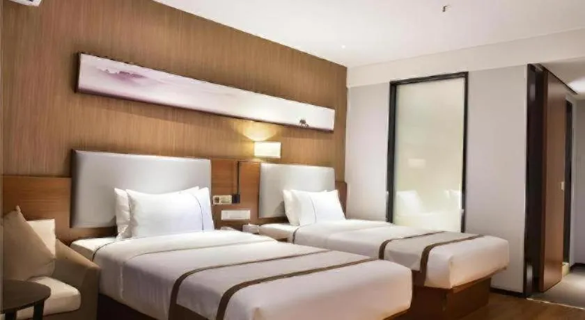 Bed in Jtour Inn Xianning Chongyang Taoxi Avenue