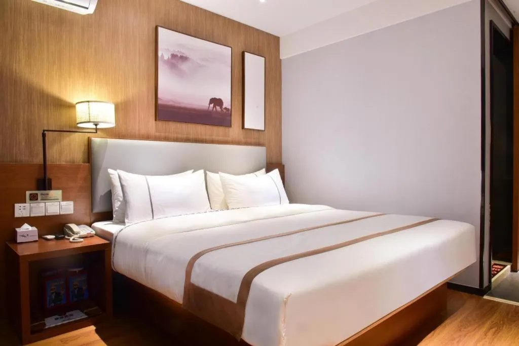 Bed in Jtour Inn Xianning Chongyang Taoxi Avenue