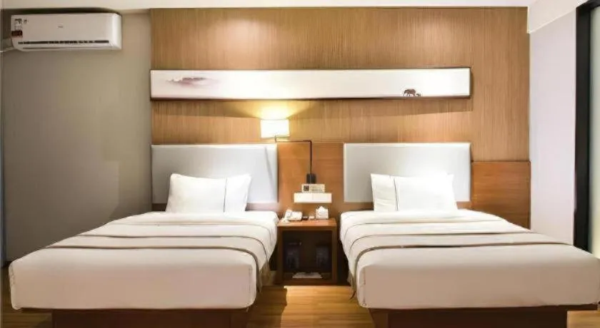 Bed in Jtour Inn Xianning Chongyang Taoxi Avenue