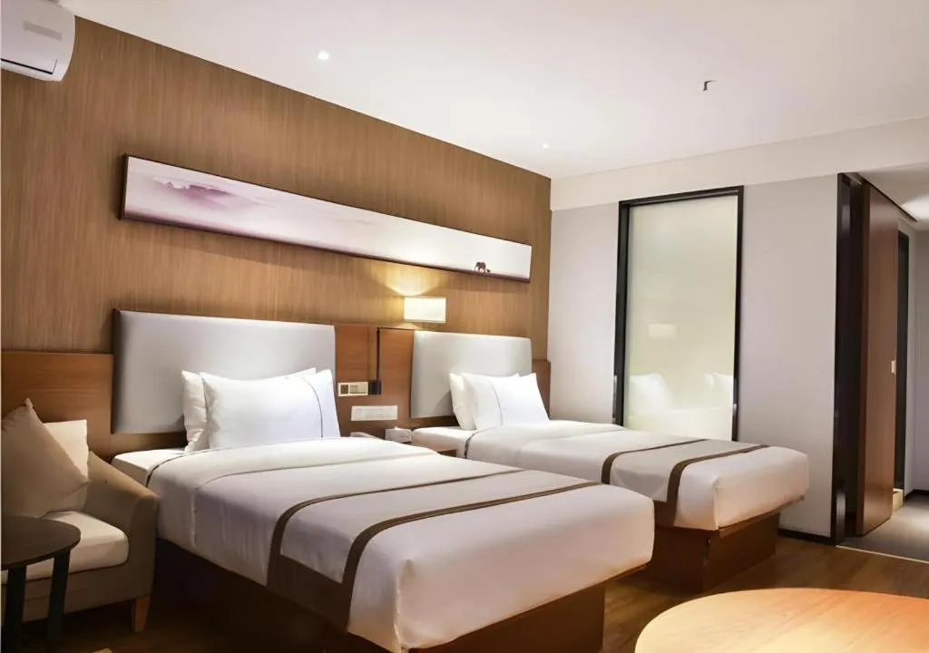 Bed in Jtour Inn Xianning Chongyang Taoxi Avenue