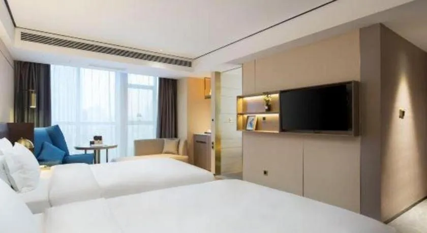 Bed in Echarm Plus Hotel Changsha High-speed Railway South Station Desiqin