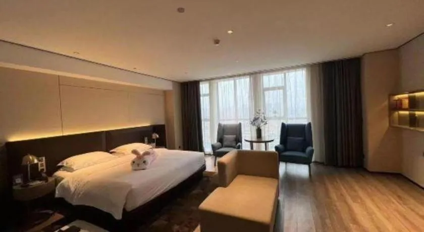 Bed in Echarm Plus Hotel Changsha High-speed Railway South Station Desiqin