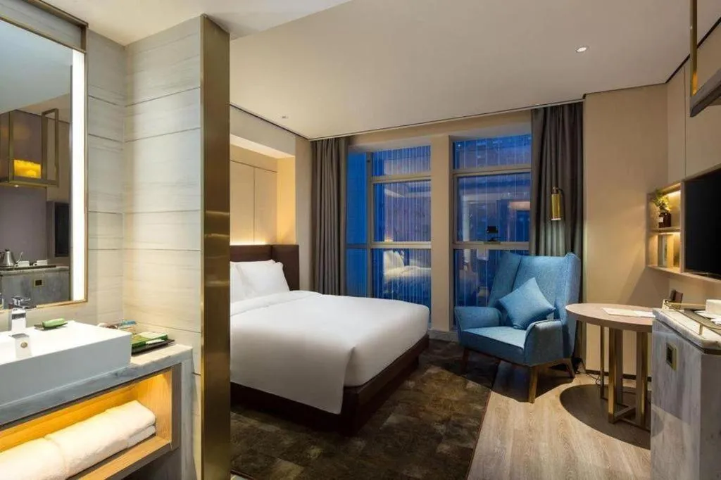 Bed in Echarm Plus Hotel Changsha High-speed Railway South Station Desiqin