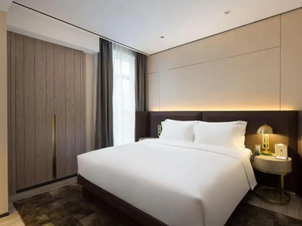 Bed in Echarm Plus Hotel Changsha High-speed Railway South Station Desiqin