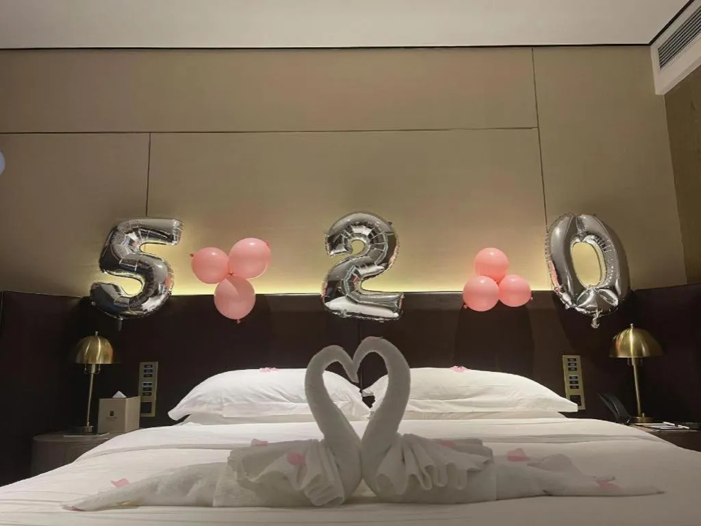 Bed in Echarm Plus Hotel Changsha High-speed Railway South Station Desiqin