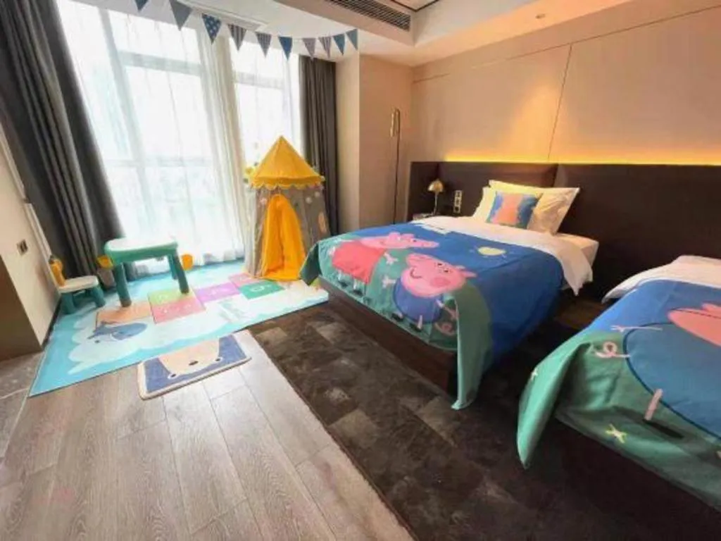 Bed in Echarm Plus Hotel Changsha High-speed Railway South Station Desiqin