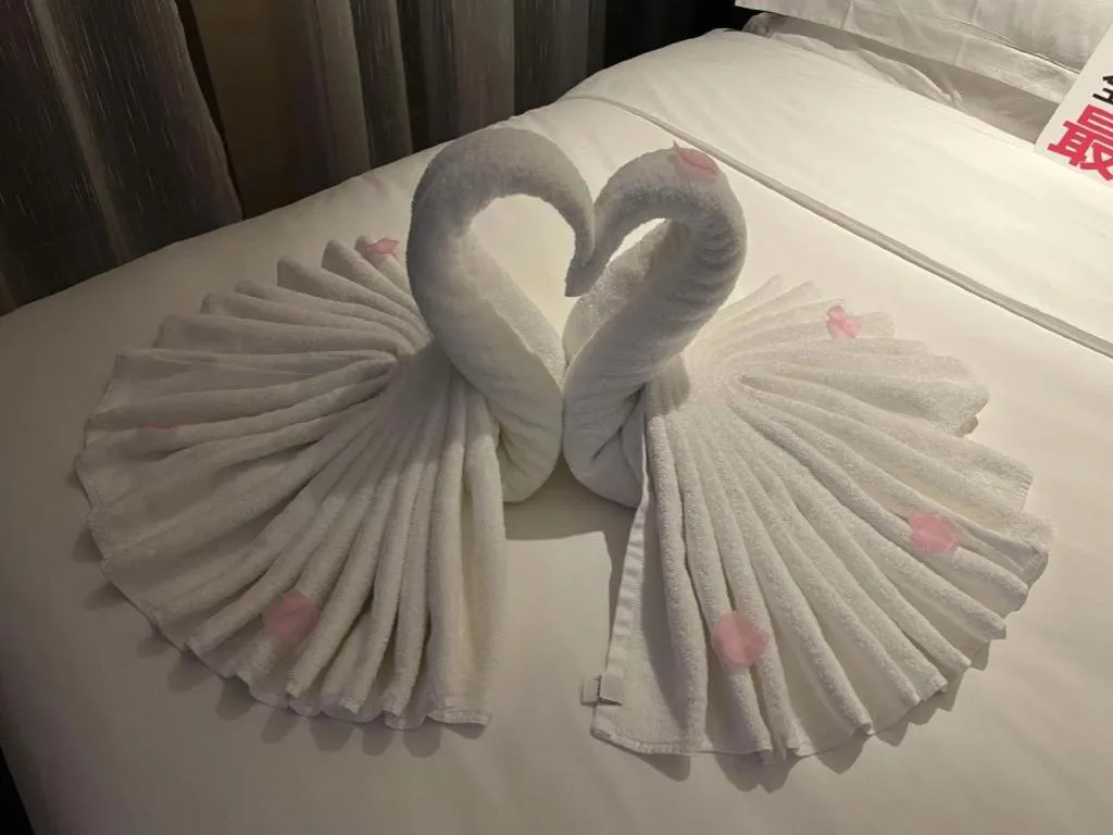 Bed in Echarm Plus Hotel Changsha High-speed Railway South Station Desiqin