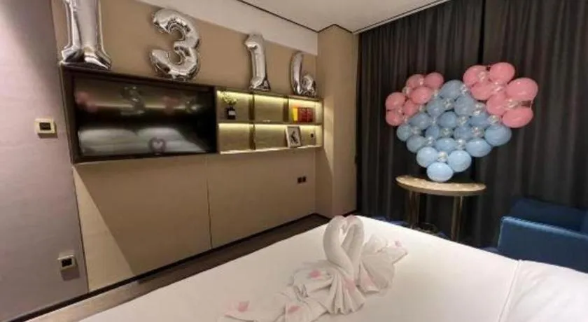 Bed in Echarm Plus Hotel Changsha High-speed Railway South Station Desiqin