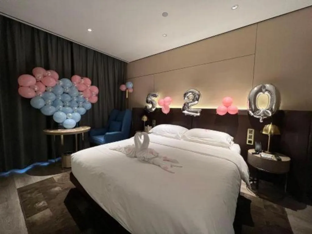 Bed in Echarm Plus Hotel Changsha High-speed Railway South Station Desiqin