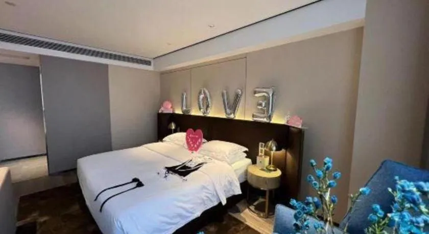 Bed in Echarm Plus Hotel Changsha High-speed Railway South Station Desiqin