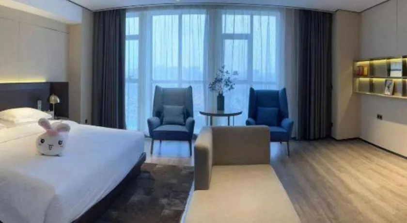 Bed in Echarm Plus Hotel Changsha High-speed Railway South Station Desiqin