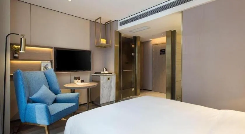 Bed in Echarm Plus Hotel Changsha High-speed Railway South Station Desiqin