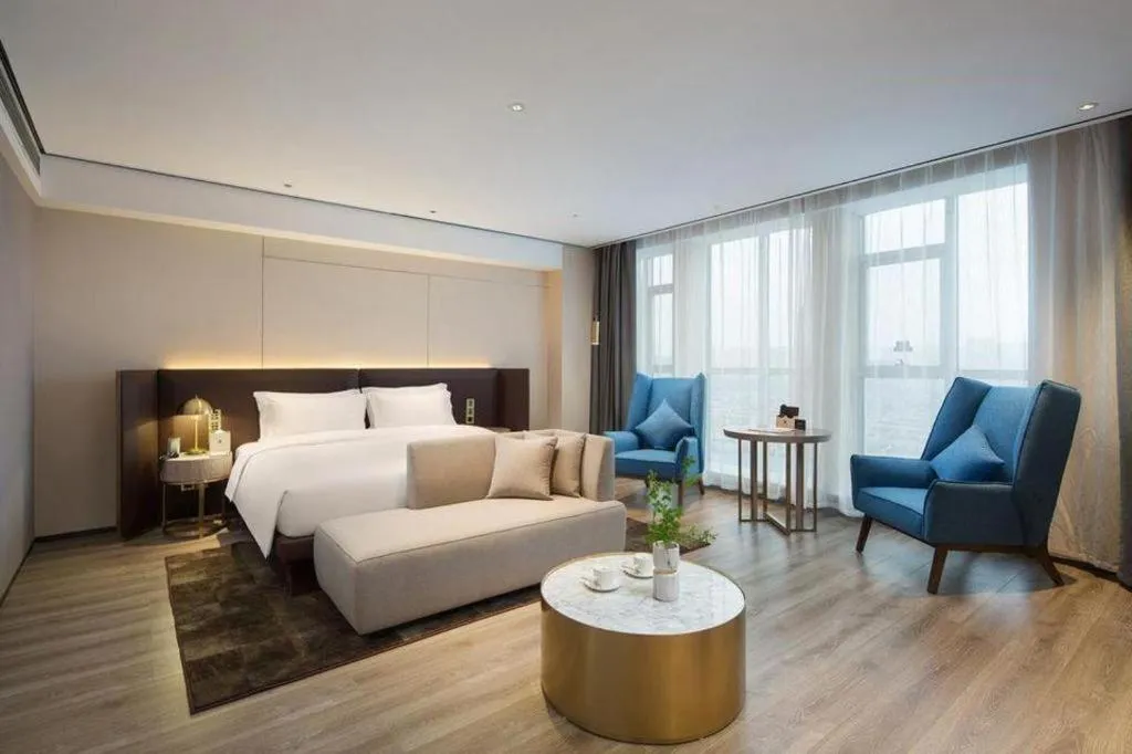 Bed in Echarm Plus Hotel Changsha High-speed Railway South Station Desiqin