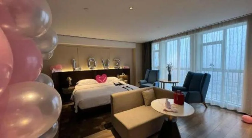 Bed in Echarm Plus Hotel Changsha High-speed Railway South Station Desiqin