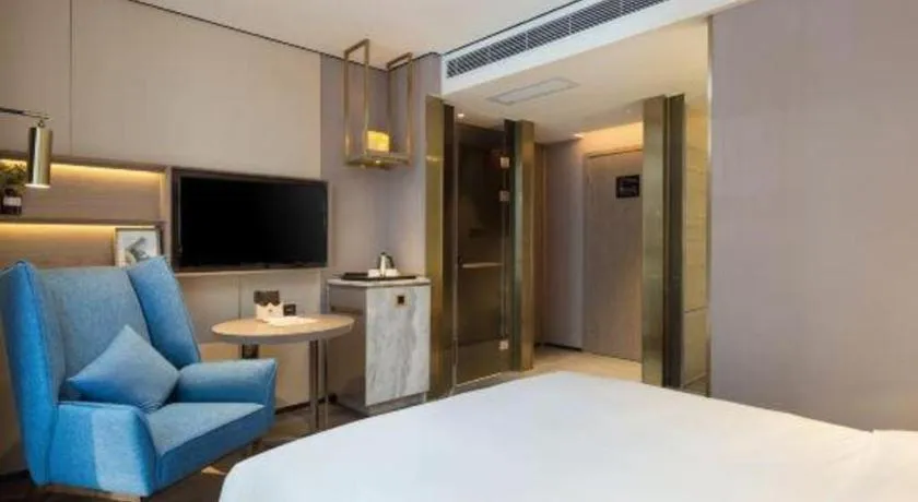 Bed in Echarm Plus Hotel Changsha High-speed Railway South Station Desiqin